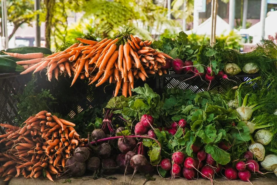 Farmers at an agricultural marketplace
